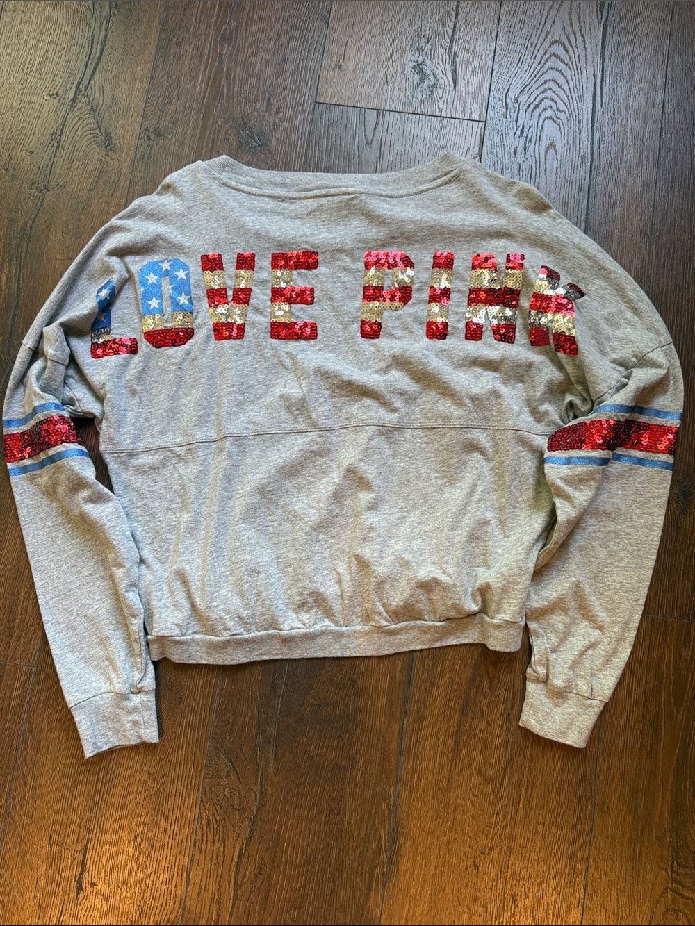 PINK Victoria's Secret Gray Crewneck Pullover with Red Sequin & Blue Trim